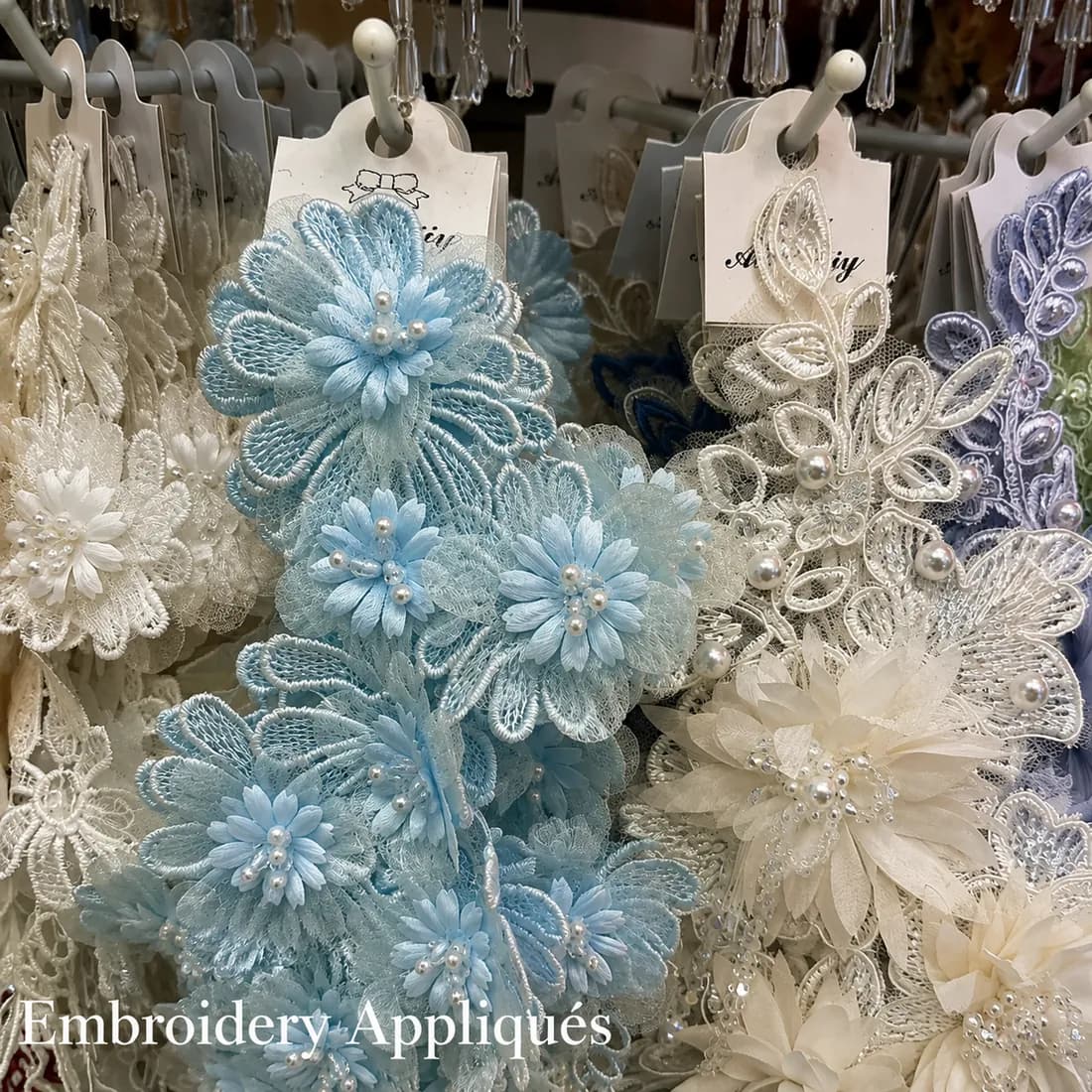 premium blue and ivory embroidered appliqués